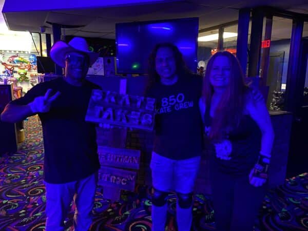 Joshua (The Skate Cowboy), Eddy and Liz with our Skate Takes sign Joshua made